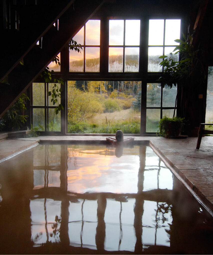 Dunton Hot Springs restored ghost town log cabin in the San Juan Mountains, Colorado